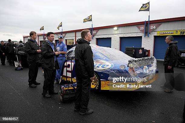 The Miller Lite Dodge driven by Kurt Busch sits in the garage area as all track activities are haulted at Talladega Superspeedway on April 24, 2010...