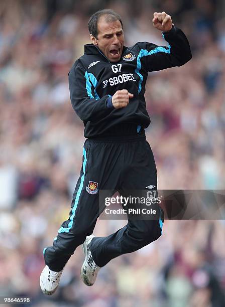 West Ham United manager Gianfranco Zola celebrates his sides third goal during the Barclays Premier League match between West Ham United and Wigan...