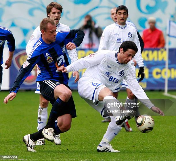 Leandro Fernandez of FC Dynamo Moscow battles for the ball with Martin Jakubko of FC Saturn Moscow Oblast during the Russian Football League...