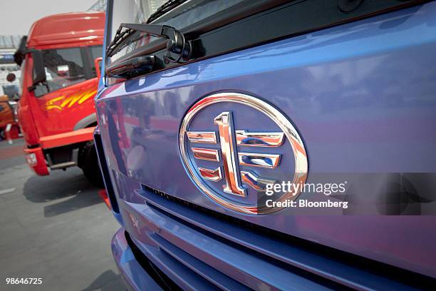 The China FAW Group Corp. Emblem is displayed at the Beijing Auto Show in Beijing, China, on Saturday, April 24, 2010. The show will be held through...