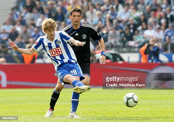 Fabian Lustenberger of Berlinis challenged by Kevin Kuranyi of Schalke during the Bundesliga match between Hertha BSC Berlin and FC Schalke 04 at...