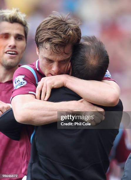 Scott Parker of West Ham celebrates with his manager Gianfranco Zola after he scores his sides third goal during the Barclays Premier League match...