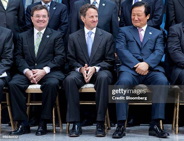 James Flaherty, Canada's finance minister, left to right, Timothy Geithner, U.S. Treasury secretary, and Yoon Jeung-Hyun, South Korea's finance...