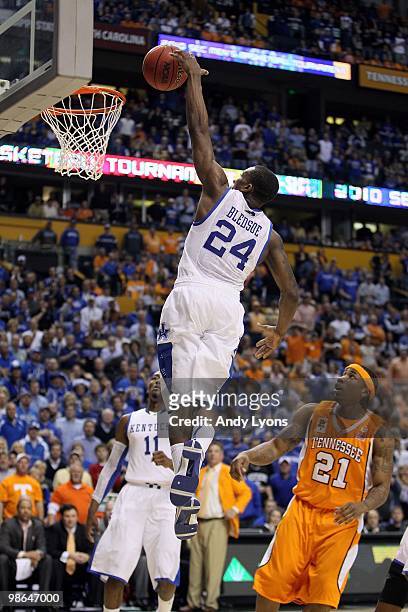 Eric Bledsoe of the Kentucky Wildcats dunks against the Tennessee Volunteers during the semirfinals of the SEC Men's Basketball Tournament at the...