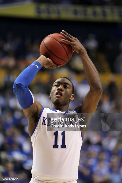 John Wall of the Kentucky Wildcats attempts a free throw shot against the Tennessee Volunteers during the semirfinals of the SEC Men's Basketball...