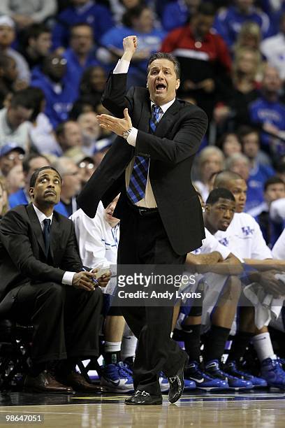 Head coach John Calipari of the Kentucky Wildcats reacts as he coaches against the Tennessee Volunteers during the semirfinals of the SEC Men's...