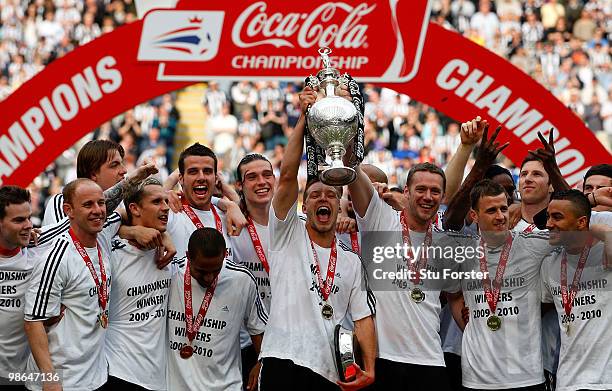 Newcastle captains Alan Smith and Kevin Nolan lift the trophy as Newcastle are crowned champions of the Championship after the Coca Cola Championship...