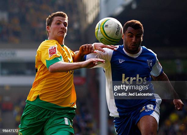 Michael Spillane of Norwich City and Rene Howe of GIllingham fight for the ball during the Coca Cola League One match between Norwich City and...