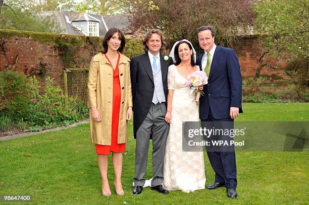 Conservative leader David Cameron and his wife Samantha with his sister Clare and her new husband Jeremy Fawcus on their wedding day on April 24,...