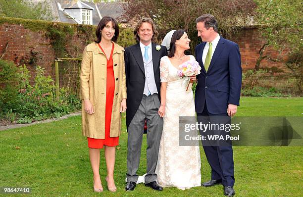 Conservative leader David Cameron and his wife Samantha with his sister Clare and her new husband Jeremy Fawcus on their wedding day on April 24,...