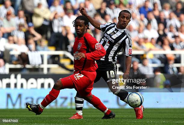 Newcastle winger Wayne Routledge tangles with Jamie Peters of Ipswich during the Coca Cola Championship match between Newcastle United and Ipswich...