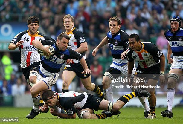 Lee Mears of Bath is tackled by Joe Worsley of Wasps during the Guinness Premiership St George's Day Game between London Wasps and Bath Rugby at...