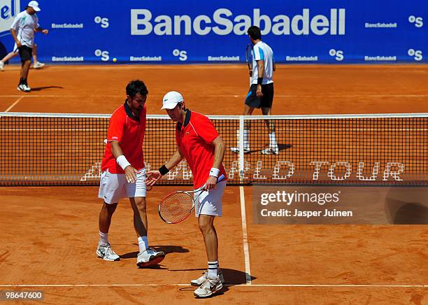 Nenad Zimonjic of Serbia celebrates a point with his doubles partner Daniel Nestor of Canada during the semi final match against Julian Knowle of...