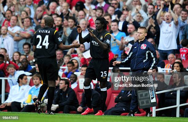 Emmanuel Adebayor of Manchester City comes on as a second half substitute for teammate Patrick Vieira during the Barclays Premier League match...