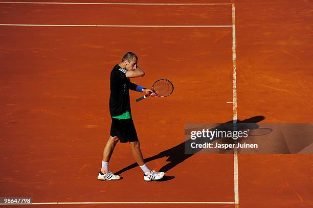 Thiemo de Bakker of the Netherlands reacts in his semi final match against Robin Soderling of Sweden on day six of the ATP 500 World Tour Barcelona...