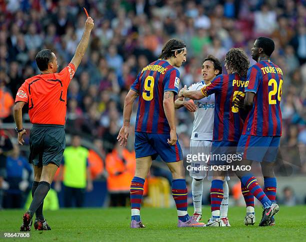 Jerez«s Chili forward Fabian Orellana is sent off during a Spanish League football match against Jerez at the Camp Nou Stadium in Barcelona , on...