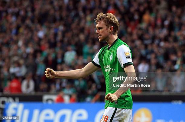 Per Mertesacker of Bremen celebrates during the Bundesliga match between Werder Bremen and 1. FC Koeln at Weser Stadium on April 24, 2010 in Bremen,...