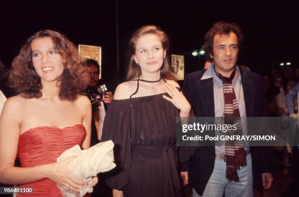 Bernardo Bertolucci, Stefania Sandrelli et Dominique Sanda lors du Festival de Cannes en mai 1976, France.
