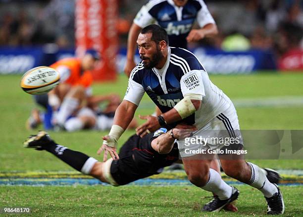 John Afoa of the Blues passes the ball during the Super 14 round 11 match between The Sharks and Blues at Absa Park Stadium on April 24, 2010 in...