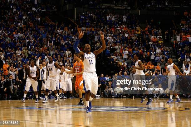 John Wall of the Kentucky Wildcats celebrates after Kentucky scored a basket in the second half against the Tennessee Volunteers during the...