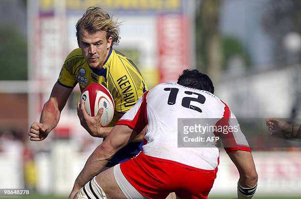 Clermont-Ferrand's player Aurelien Rougerie runs with the ball during the French Top 14 rugby union match Biarritz vs. Clermont Ferrand on April 24,...
