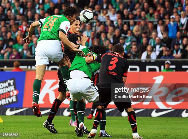 Claudio Pizarro of Bremen heads at goal during the Bundesliga match between Werder Bremen and 1. FC Koeln at Weser Stadium on April 24, 2010 in...