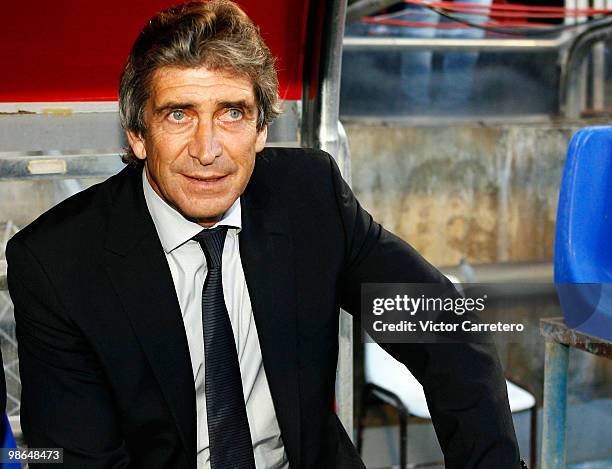 Real Madrid coach Manuel Pellegrini looks on during the La Liga match between Zargoza and Real Madrid at La Romareda on April 24, 2010 in Zaragoza,...