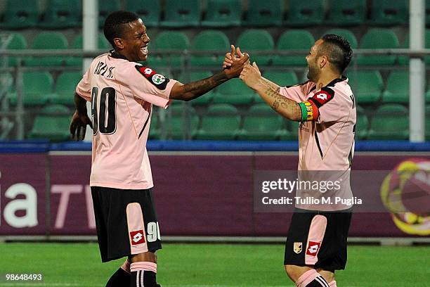 Abel Hernandez and Fabrizio Miccoli of Palermo celebrate the second goal during the Serie A match between US Citta di Palermo and AC Milan at Stadio...