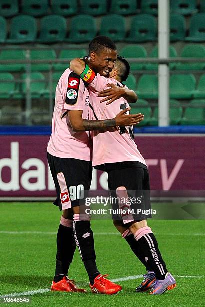 Abel Hernandez of Palermo celebrates with team mate Fabrizio Miccoli after scoring his team's second goal during the Serie A match between US Citta...