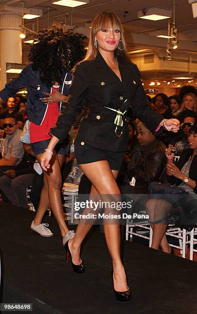 Adrienne Bailon and Teyana Taylor attends the Cavi Juniors Spring 2010 Fashion Show at Macy's Herald Square on April 23, 2010 in New York City.