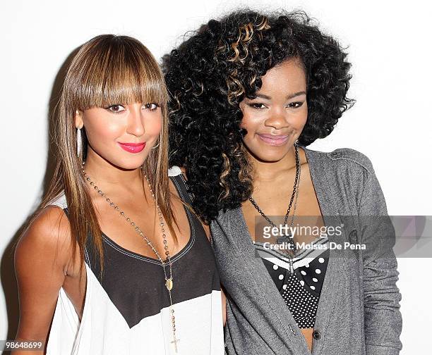 Adrienne Bailon and Teyana Taylor attend the Cavi Juniors Spring 2010 Fashion Show at Macy's Herald Square on April 23, 2010 in New York City.