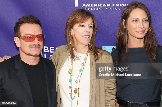 Musician Bono, Tribeca Film Festival co-founder Jane Rosenthal and model Christy Turlington Burns attend the premiere of "No Woman No Cry" during the...