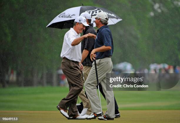 Jay Haas and Fred Couples celebrate a birdie on during the second round of the Legends Division at the Liberty Mutual Legends of Golf at The Westin...