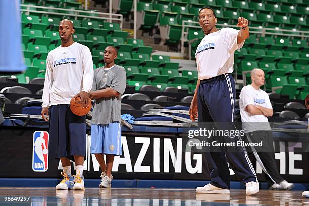 Assistant coach Adrian Dantley coaches Chauncey Billups of the Denver Nuggets during practice prior to Game Four of the Western Conference...