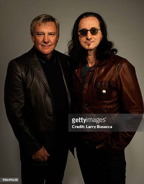 Musicians Alex Lifeson and Geddy Lee from the band Rush attend the Tribeca Film Festival 2010 portrait studio at the FilmMaker Industry Press Center...