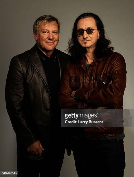 Musicians Alex Lifeson and Geddy Lee from the band Rush attend the Tribeca Film Festival 2010 portrait studio at the FilmMaker Industry Press Center...