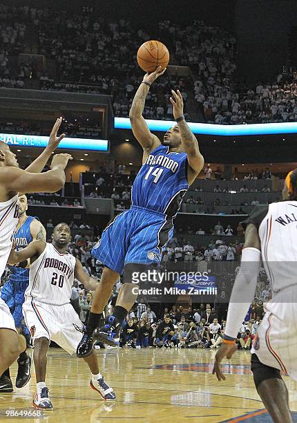 Guard Jameer Nelson of the Orlando Magic shoots a fade away shot during the game between the Charlotte Bobcats and the Orlando Magic during Game...