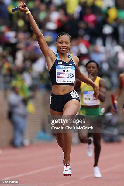 Allyson Felix of USA Blue celebrates victory in the USA vs The World Womens 4 x 400-meter relay during the Penn Relays at Franklin Field April 24,...