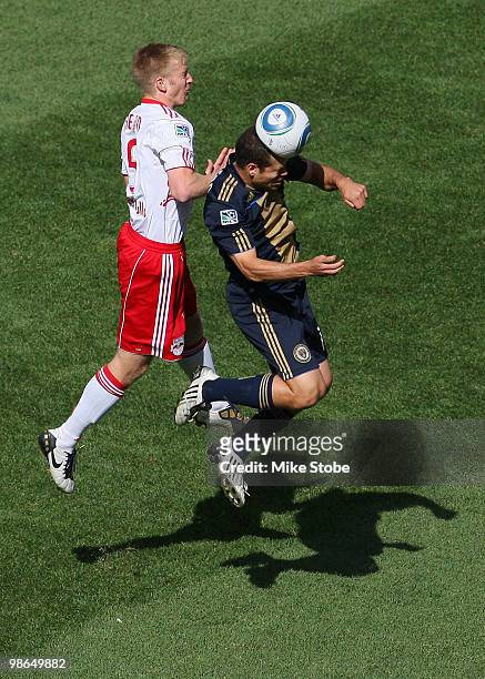 Alejandro Moreno of the Philadelphia Union heads the ball in front of Tim Ream of the New York Red Bulls on April 24, 2010 at Red Bull Arena in...