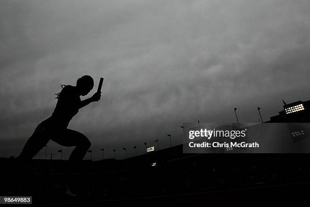 Rosemarie Whyte of Jamaica runs the first leg in the USA vs The World Womens 4 x 400-meter relay during the Penn Relays at Franklin Field April 24,...