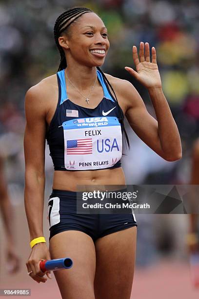 Allyson Felix of USA Blue celebrates victory in the USA vs The World Womens 4 x 400-meter relay during the Penn Relays at Franklin Field April 24,...