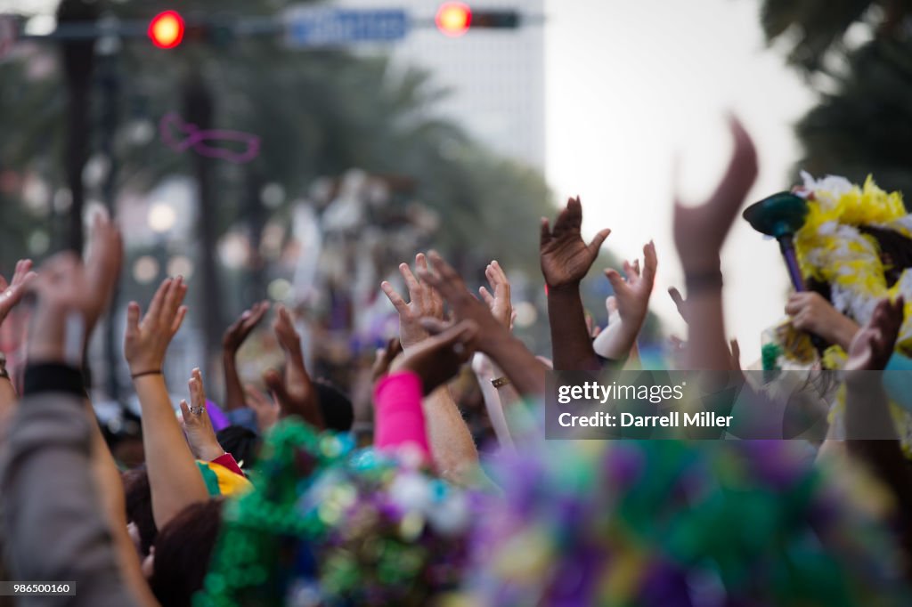 Crowd partying and raising hands during festival