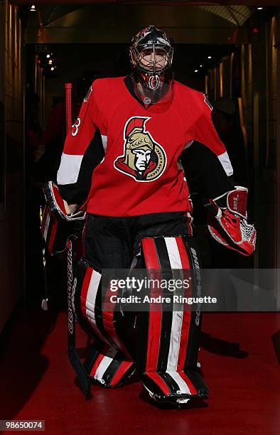 Pascal Leclaire of the Ottawa Senators leads his team out from the players' tunnel for wamups before their matchup against the Pittsburgh Penguins in...
