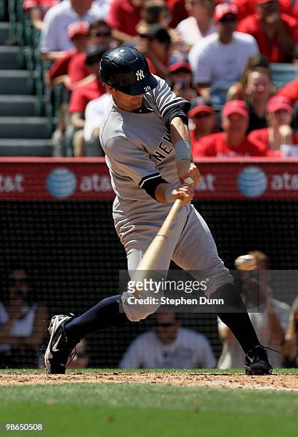 Francisco Cervelli of the New York Yankees hits a two RBI single in the fourth inning against the Los Angeles Angels of Anaheim on April 24, 2010 at...