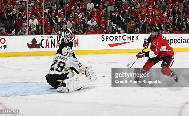 Matt Cullen of the Ottawa Senators shoots the puck past Marc-Andre Fleury of the Pittsburgh Penguins for the first goal of the game in Game Six of...