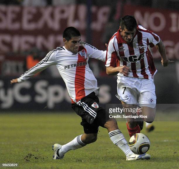 The player Cristian Villagra of River Plate fights for the ball with Jose Sosa of Estudiantes during an Argentina´s first division soccer match at...