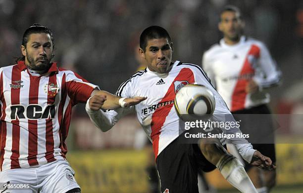 The player Cristian Villagra of River Plate fights for the ball with Christian Cellay of Estudiantes during an Argentina´s first division soccer...