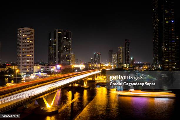 lights on the chao praya river - praya stock pictures, royalty-free photos & images
