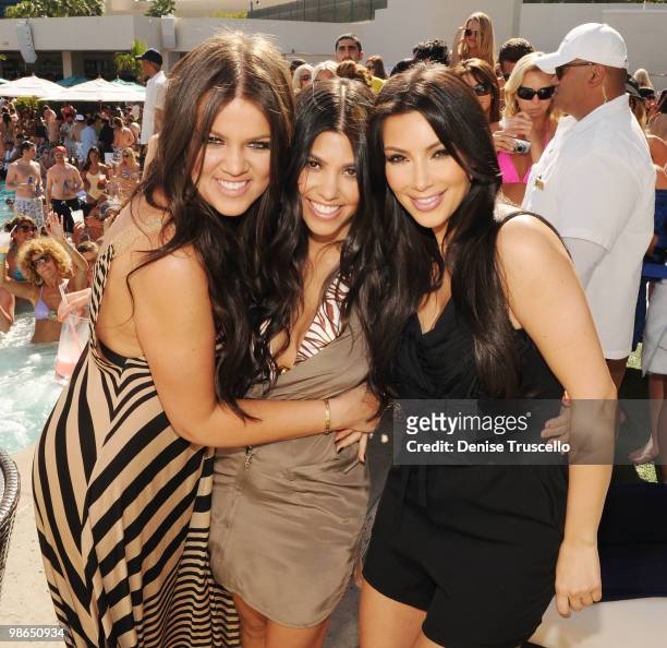 Khloe Kardashian, Kourtney Kardashian and Kim Kardashian attend Wet Republic on April 24, 2010 in Las Vegas, Nevada.