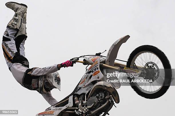Colombian motorcyclits Sebastian Mejia "Tata" performs during a freestyle motocross show at the Two Wheels Fair on April 24, 2010 in Medellin,...